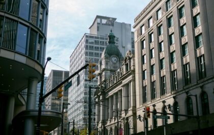 5 day trip vancouver. vancouver canada bc city tower light street modern glass cement tourist tourism clock historic cloudy cloud harsh sun twilight america